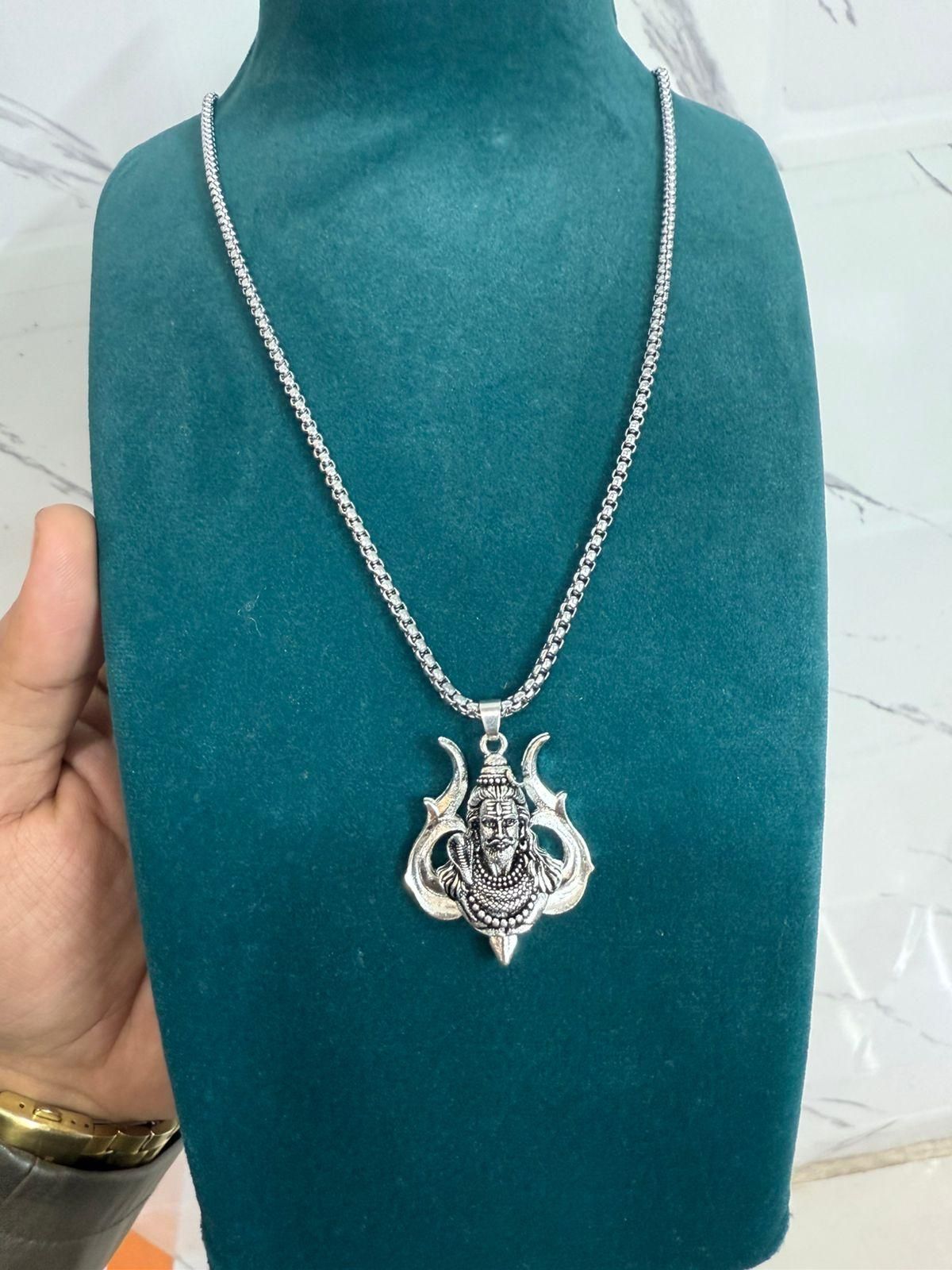 A silver-colored stainless steel chain necklace with a Hanuman pendant