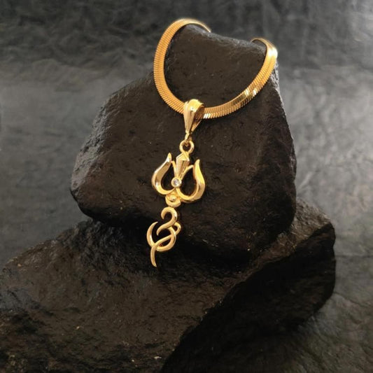 A gold-plated trishul pendant with a chain displayed on a dark textured surface.