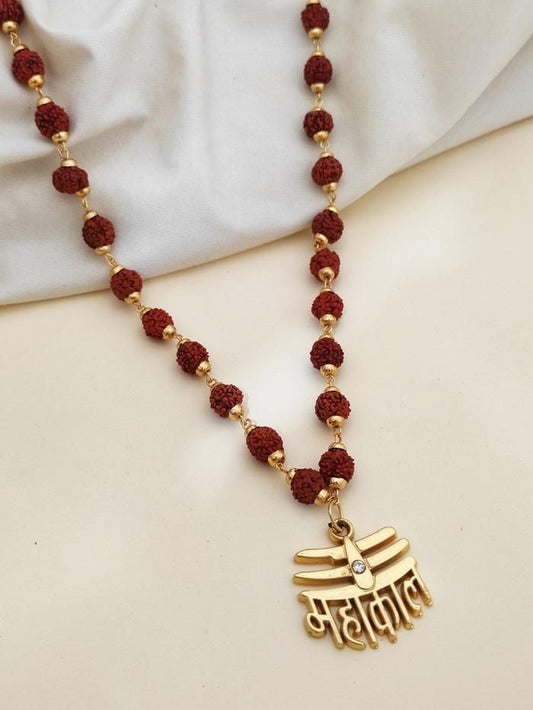 A Rudraksha Mala with red beads and a gold-colored Mahakal pendant, displayed against a white background.